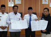 Pemkab Bersama KPU dan Bawaslu OKI Tandatangani NPHD Pemilu