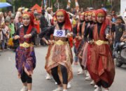 Ratusan Pelajar di OKI Ramaikan Lomba Gerak Jalan dengan Kostum Unik