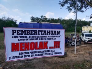 Masyarakat Desa Surya Adi Tolak Alih Fungsi Lapangan Sepak Bola jadi Taman Desa
