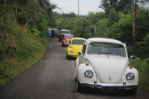 Peserta Jamda Babel Pawai Tunggangi Mobil VW