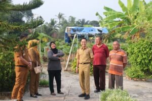 Sekda Palembang Pimpin Warga Gandus Gotong Royong Bersihkan Saluran Air